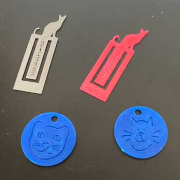 bookmarks with cats and keyfobs with cat faces